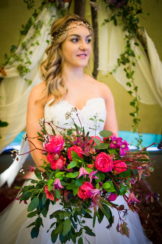 Bride with large pink bouquet