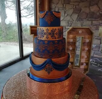 Rose gold & royal blue wedding cake