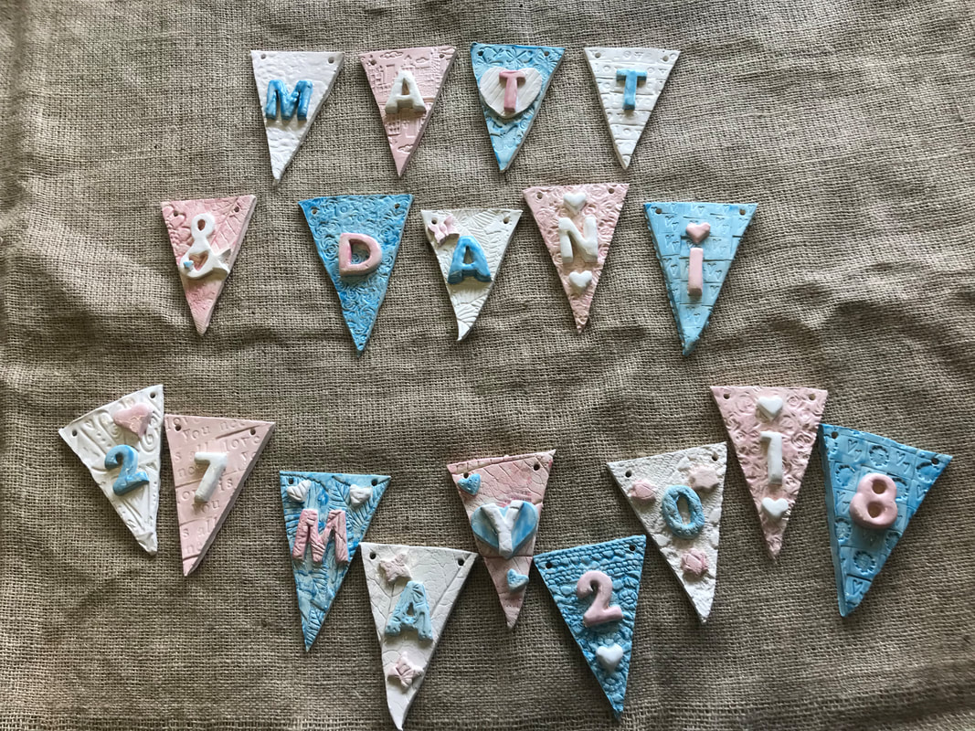 Handmade pottery bunting after experience 