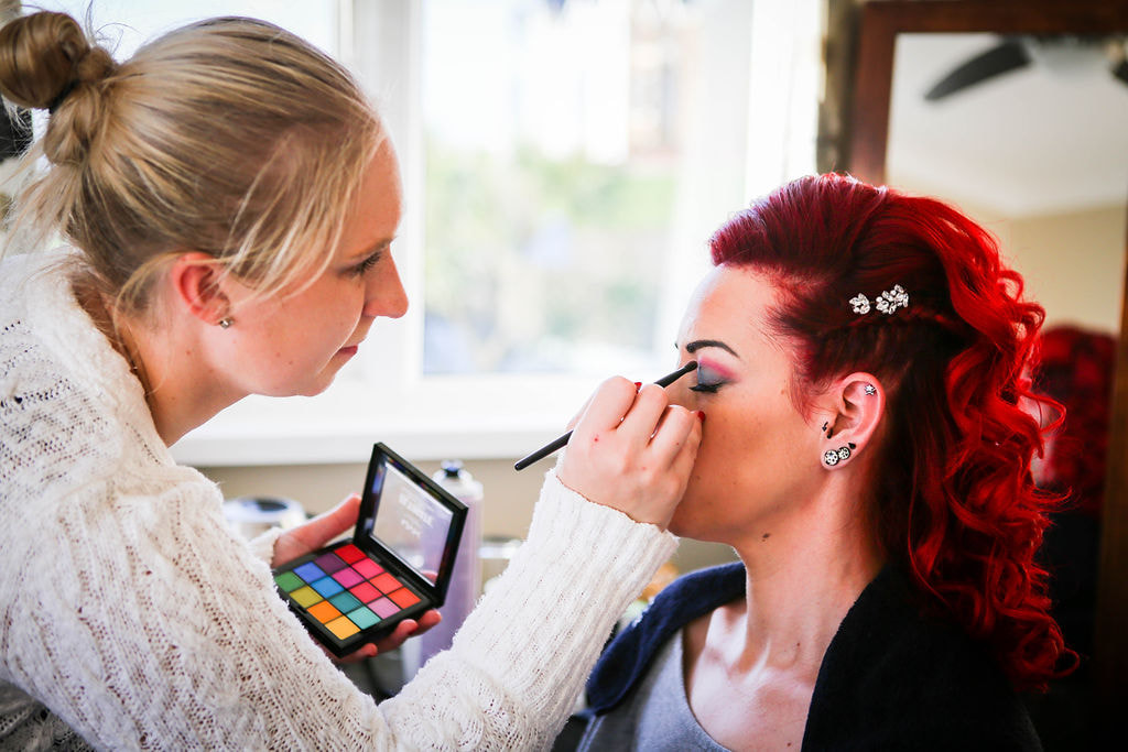Make up artist applying make up