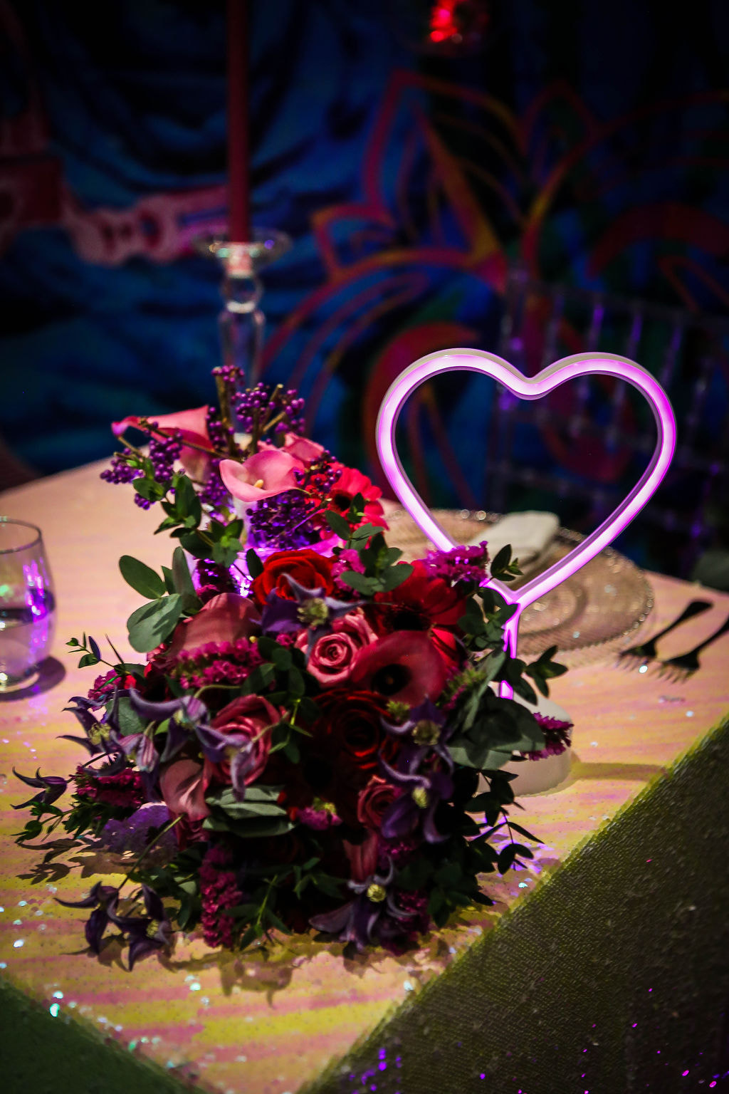Pink and purple bridal bouquet with pink neon heart