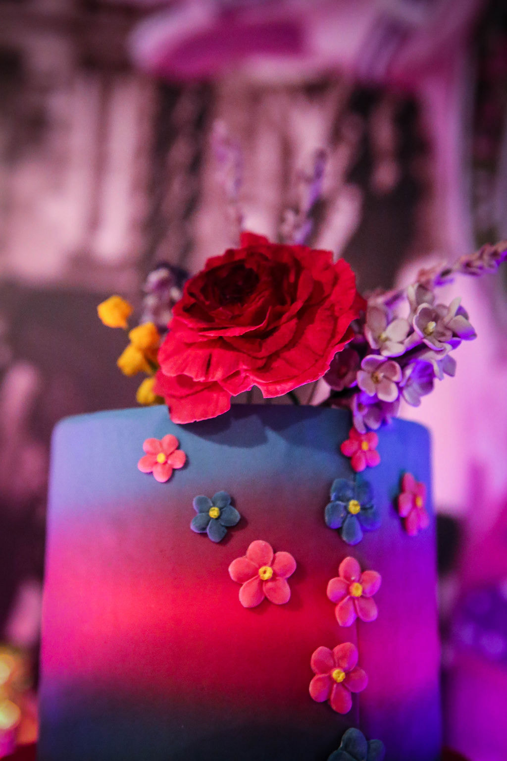Bright, neon inspired wedding cake with handmade sugar flowers