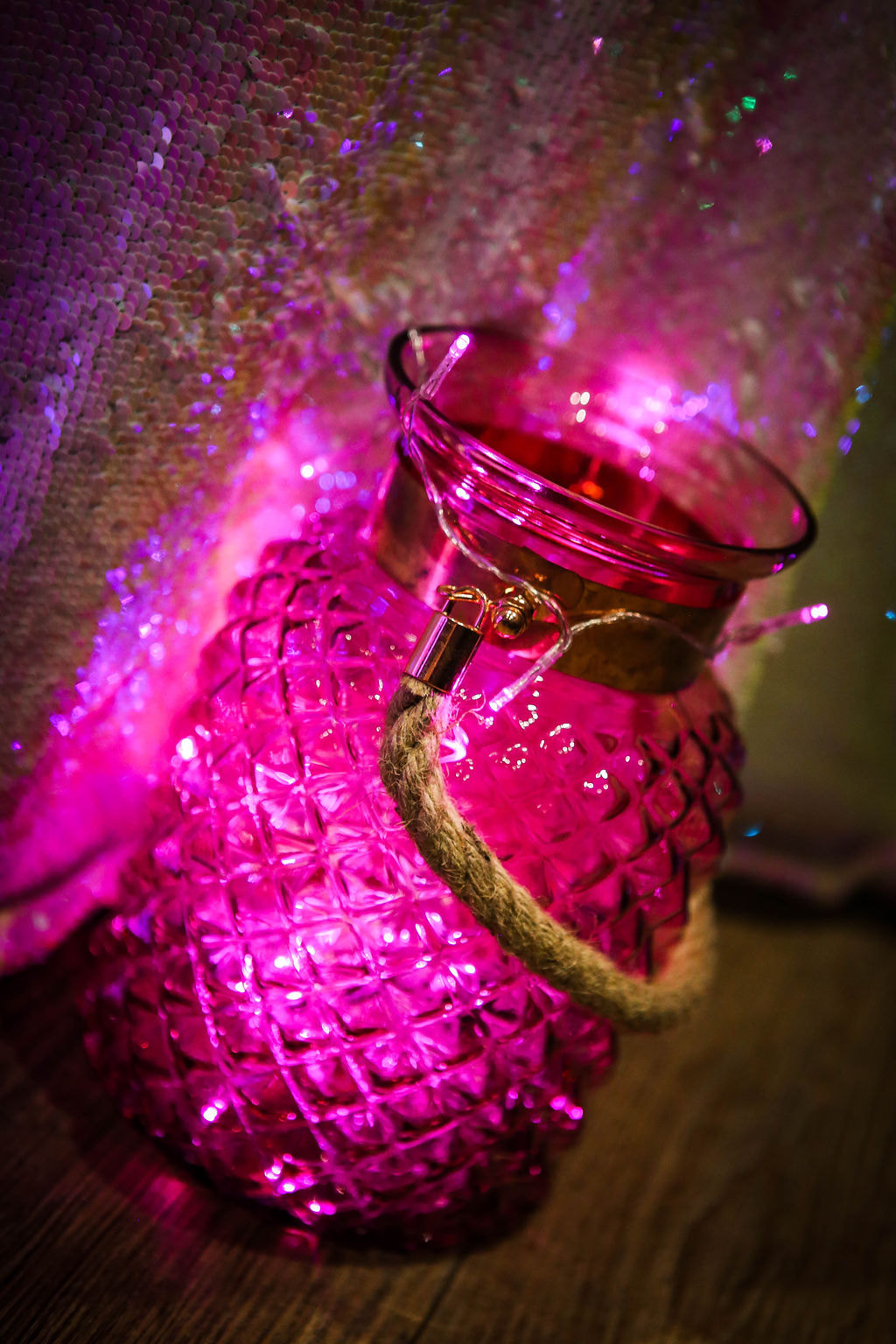 Pink vase for fairy lights at wedding