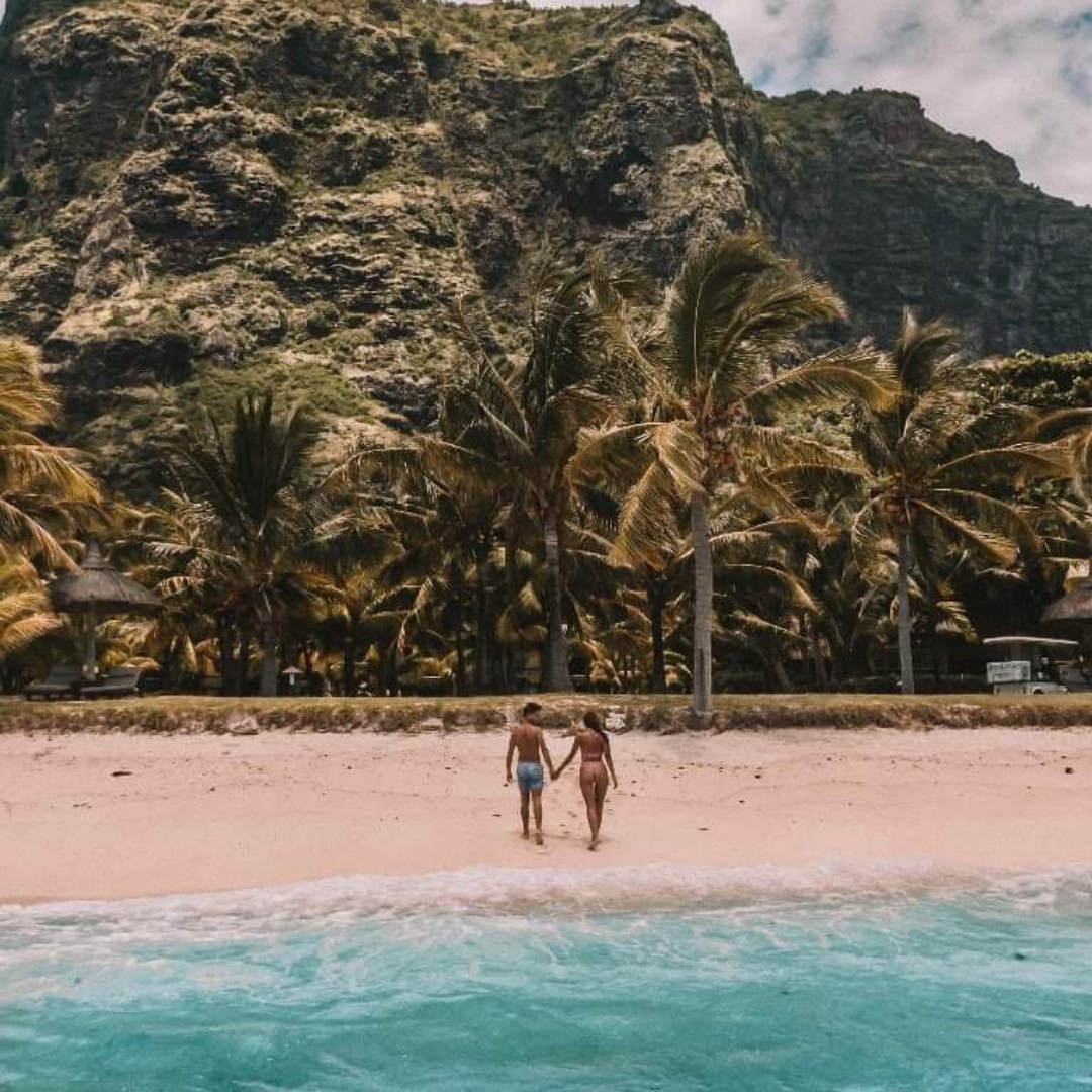 Mauritius, with couple walking on beach