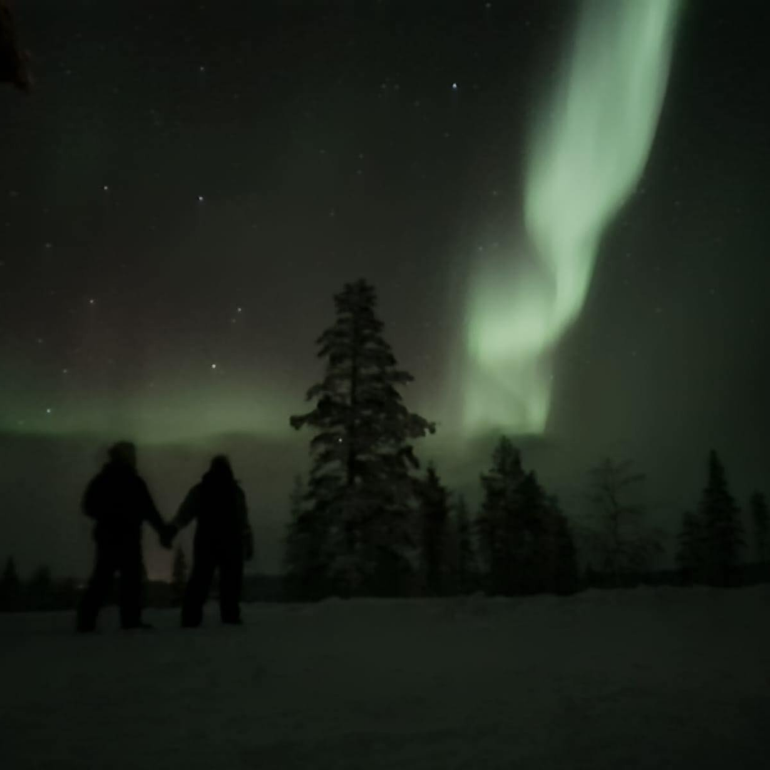 One of Gills couples watching the Northern lights on their honeymoon