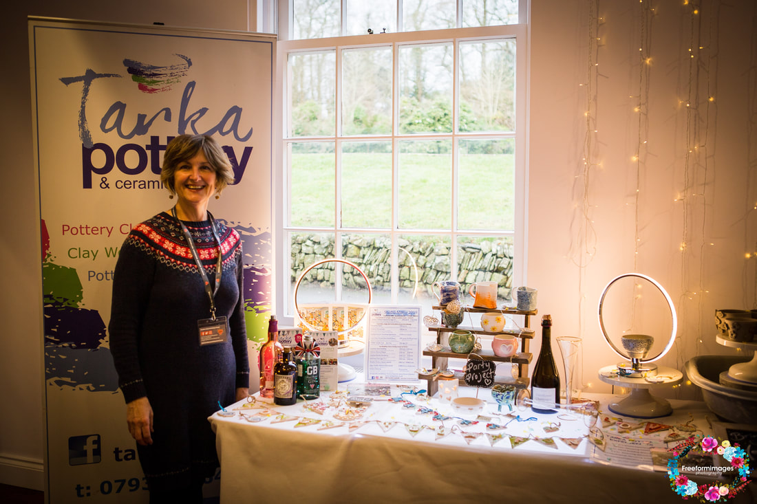 Jax from Tarka Pottery with her display